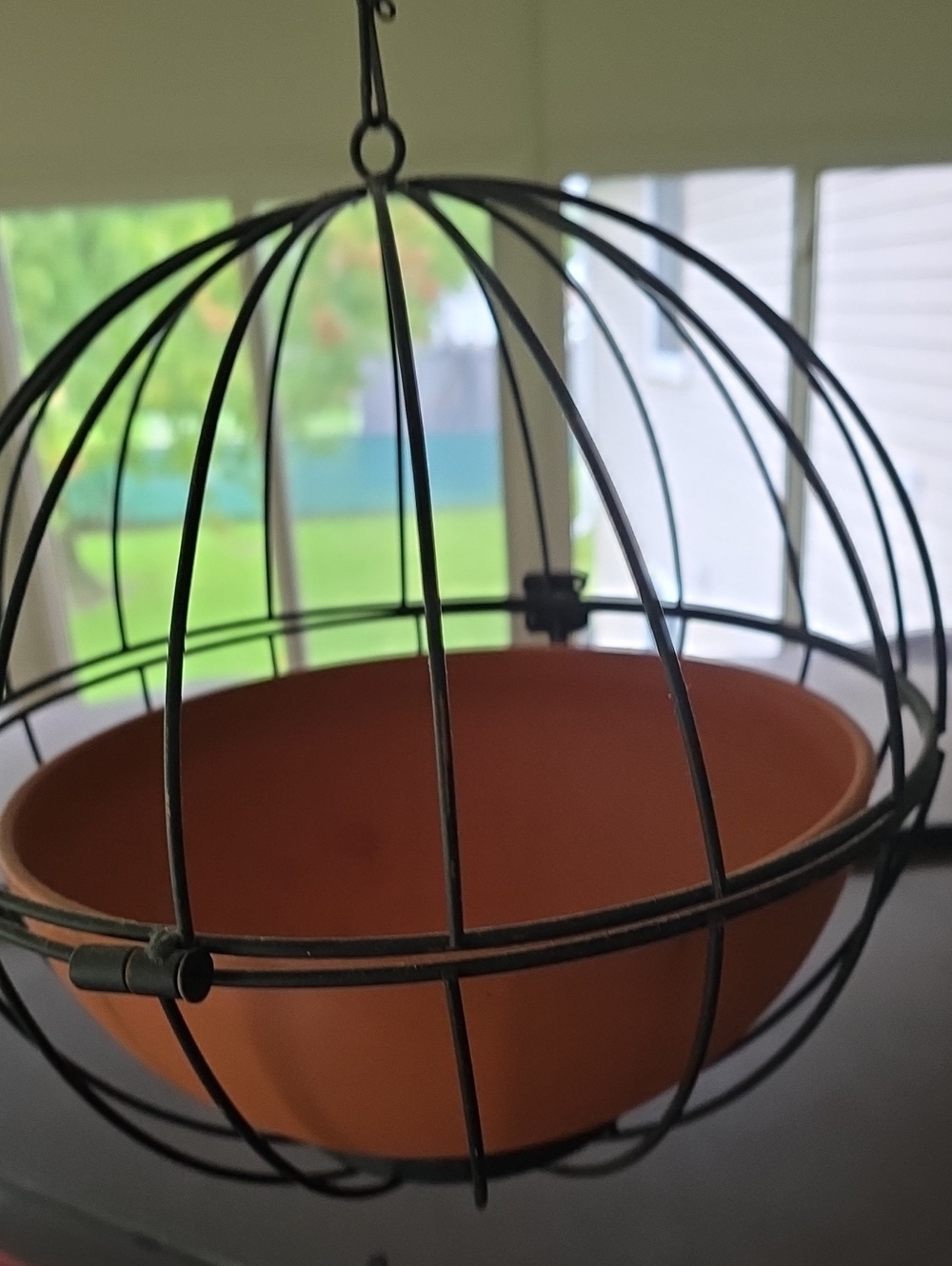Black Metal Hanging Orb Planter with Terracotta Pot